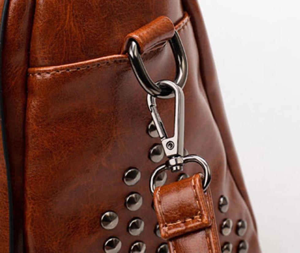 Women's fashion solid color iron ornaments rivets covered shoulder bag